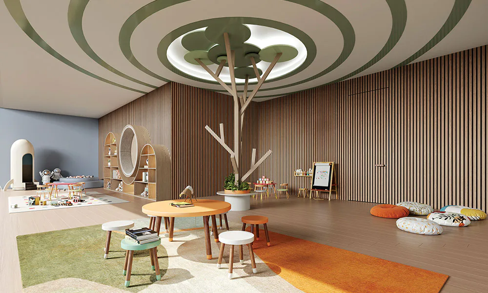 Creche and daycare room with a tree-shaped play structure at Rustomjee Urban Woods