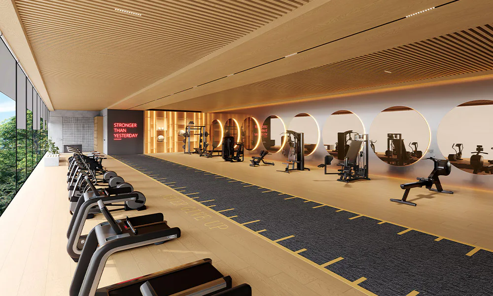 Gymnasium with a run track and a glazed wall at Rustomjee Urban Woods